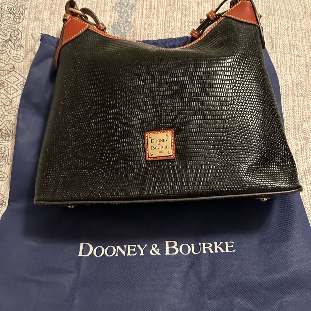 Like new black Dooney and Bourke hobo bag.